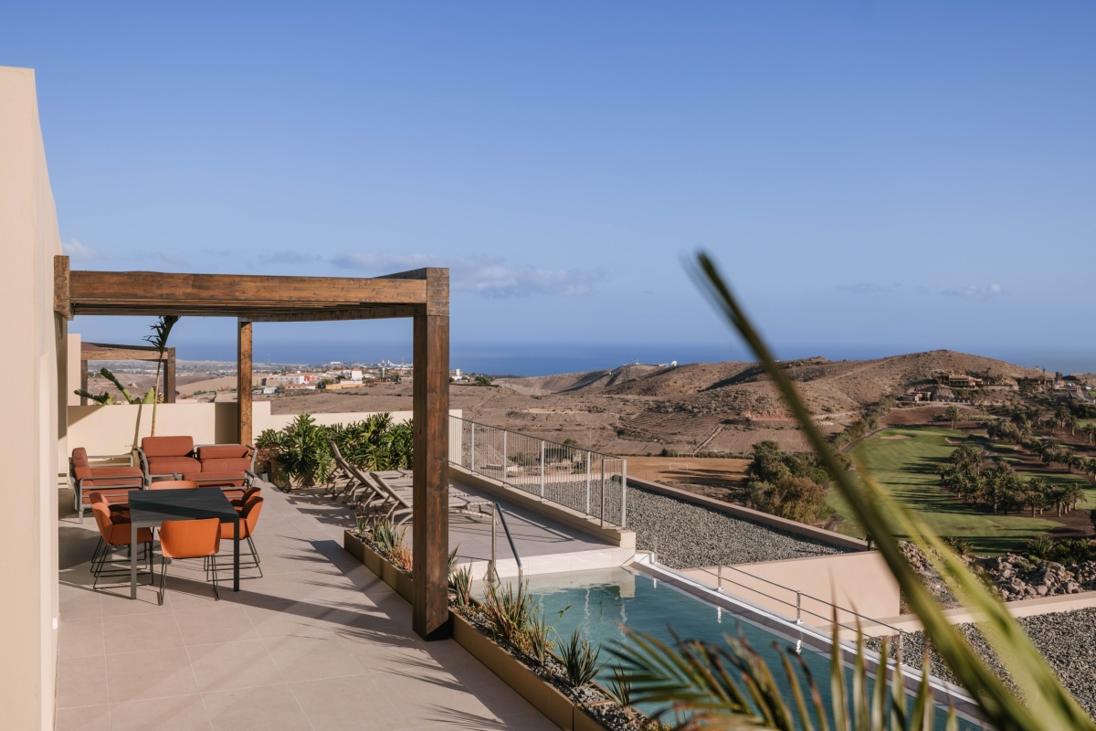 patio area of a villa in Salobre Golf, with panoramic ocean view.